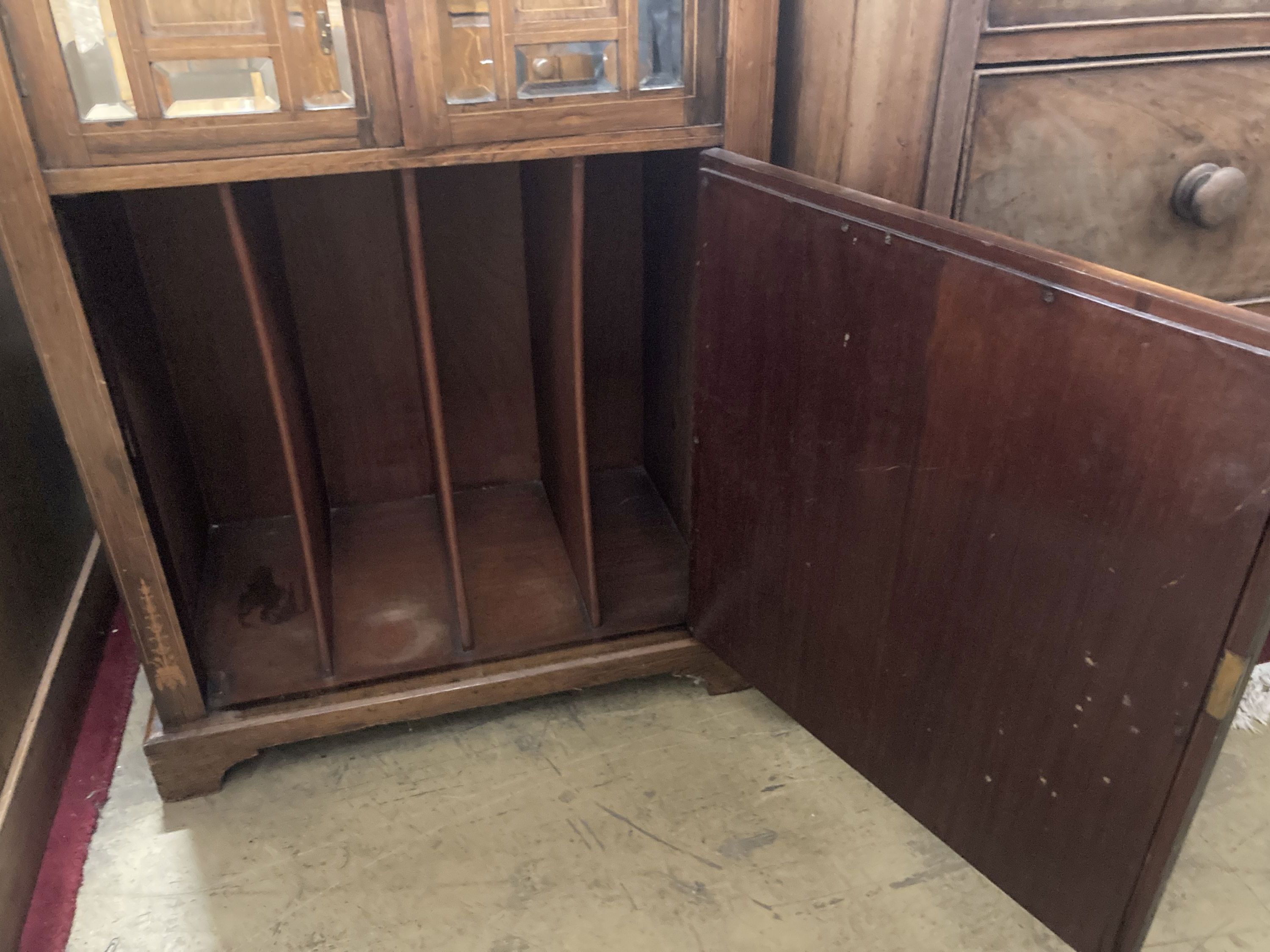 A late Victorian inlaid rosewood mirrored music cabinet, width 61cm, depth 38cm, height 105cm